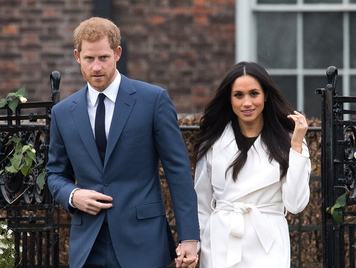Výraz Meghan Markle sa zmenil, keď princ Harry povedal, že môže byť tímovým hráčom s princom Williamom a Kate